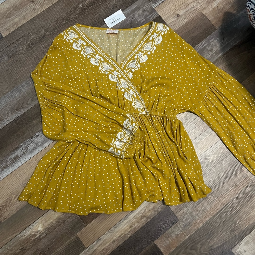 Embroidered Peplum Top